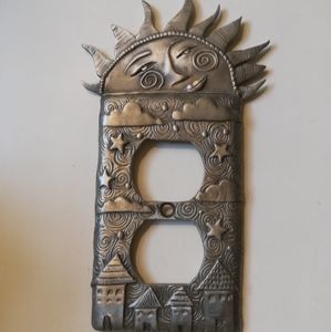 Artistic, whimsical pewter outlet cover